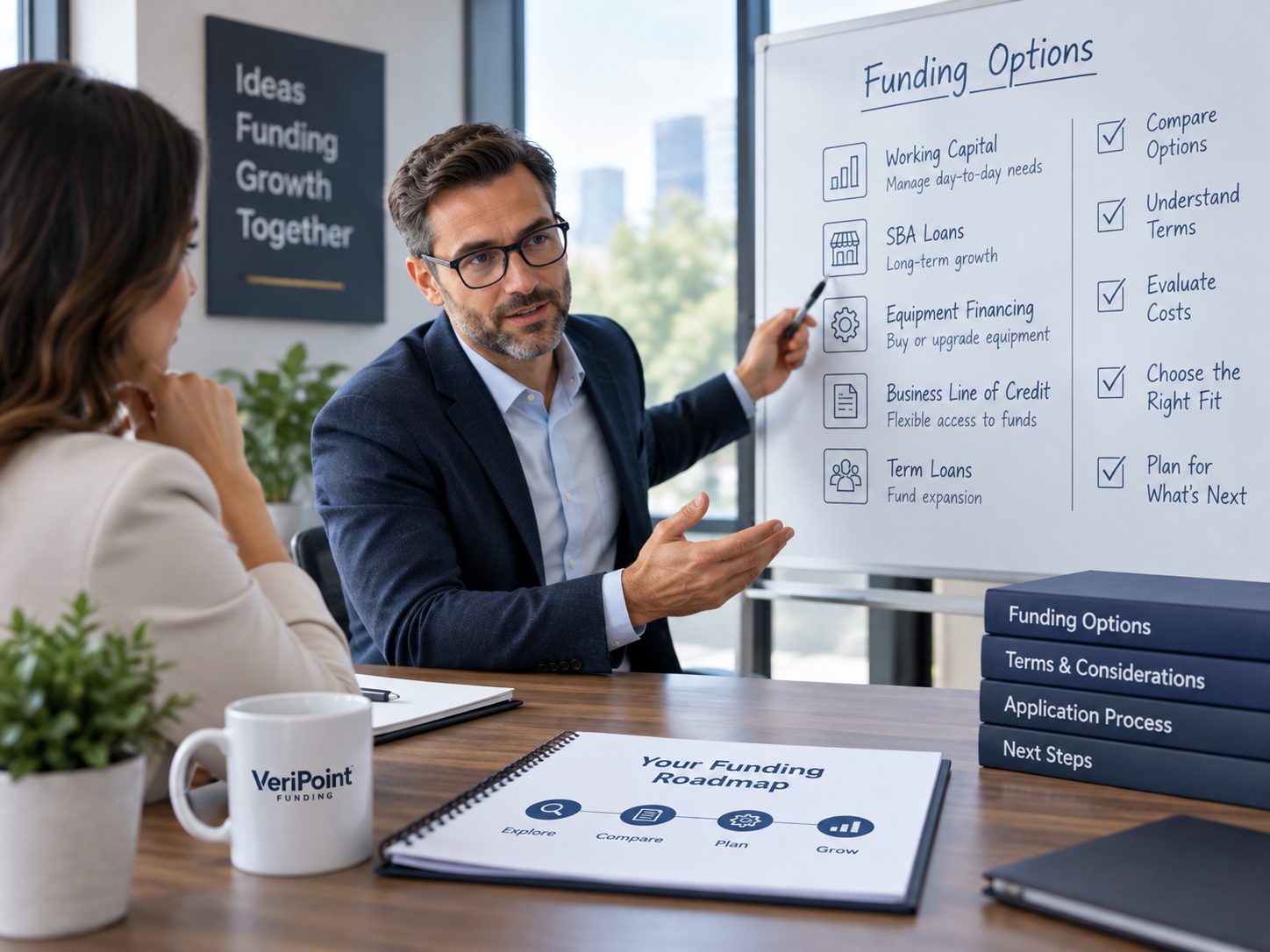 Established business owner reviewing a business funding guide at a laptop